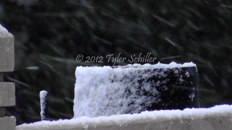 Snow accumulates on Davis Weather Station - January 1, 2012